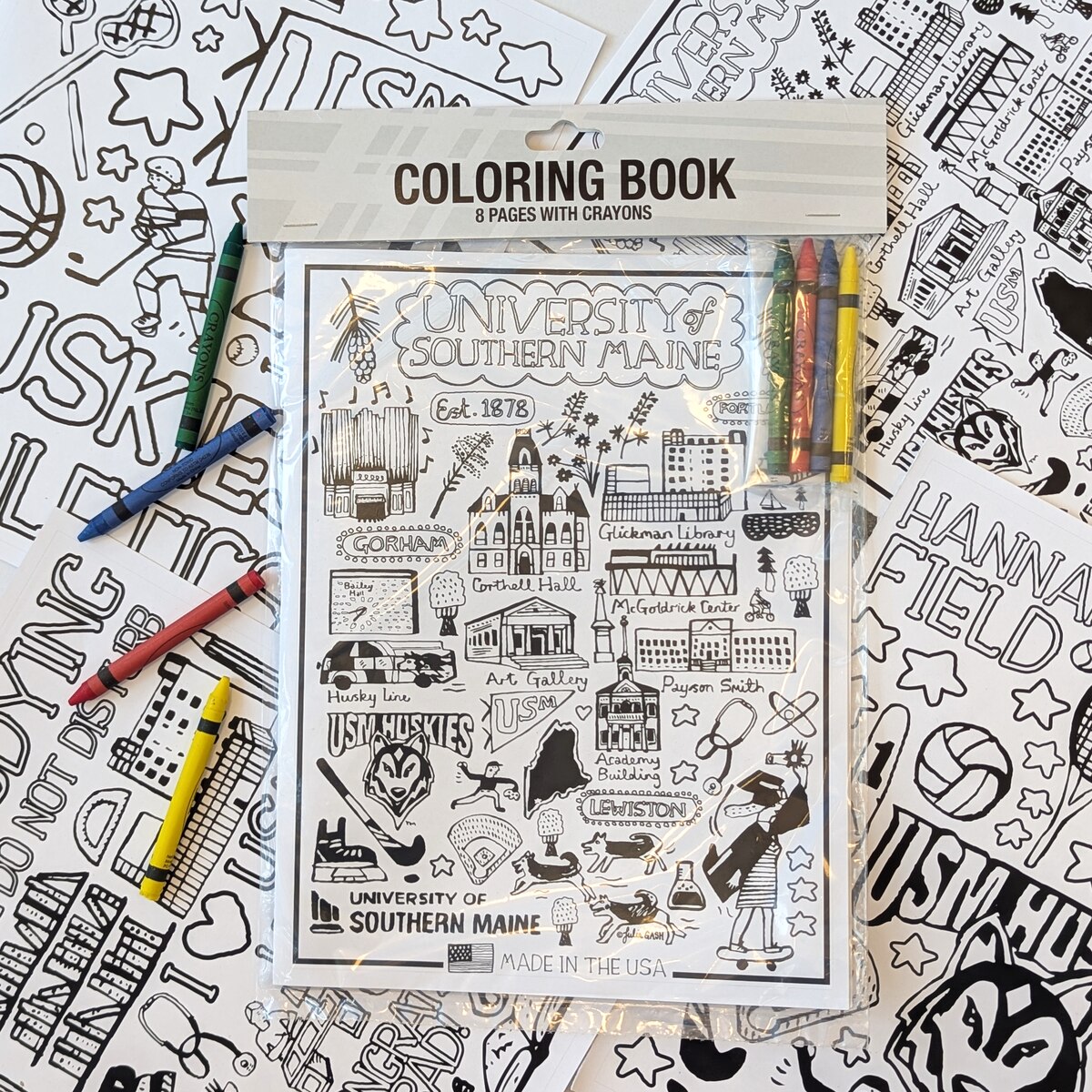 University of Southern Maine coloring book with 8 pages. Features various campus landmarks and includes four crayons.