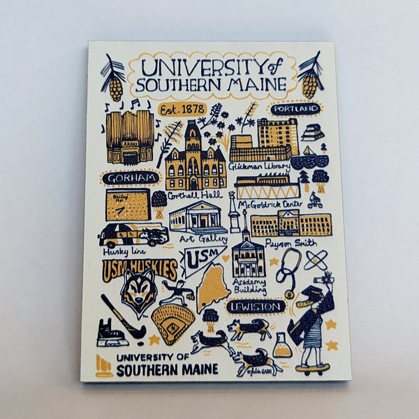 A rectangular wooden magnet with a navy and gold collage of University of Southern Maine landmarks.